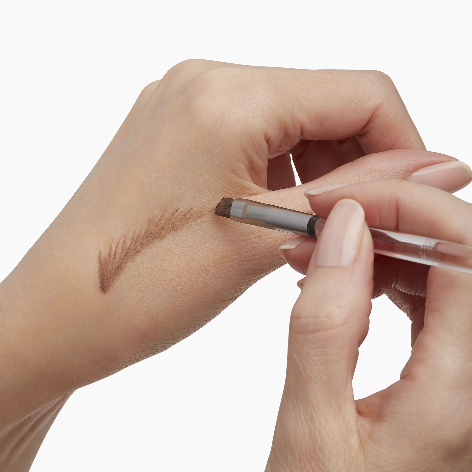 precision-dual-sided-eyebrow-brush-x5 85315_PrecisionDualSidedEyebrowBrush_Model_V2.jpg